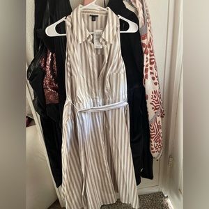 Torrid knee length dress. New with tags. Doesn’t fit my chest…. DDD or smaller.